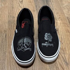 BRAND NEW. NEVER WORN! Vans Black Slip-On Sneakers with Skull and Rose Design